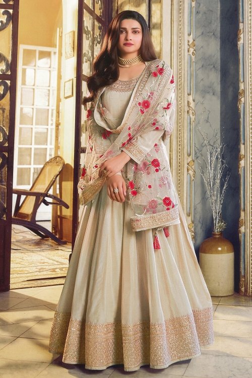 Prachi Desai Vanilla Cream Anarkali Suit with Embroidered Neck and Border in Art Silk